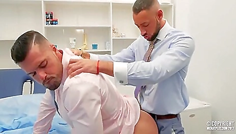 Sexy young chick masturbates with two men